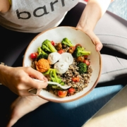 How to lose weight naturally, showing a person eating healthy food.